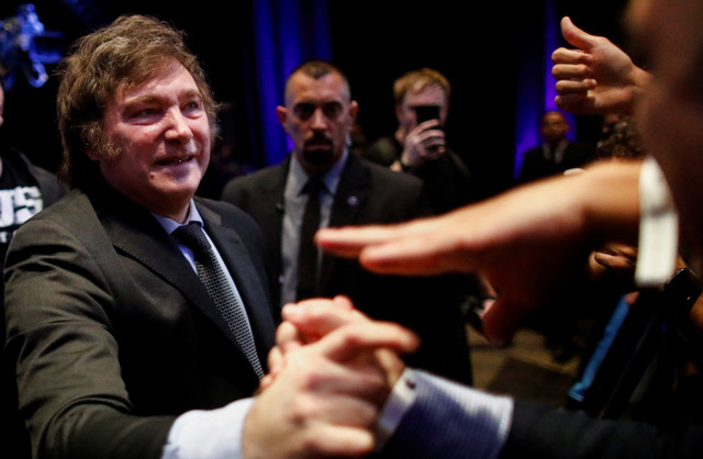  Argentine president-elect Javier Milei greets his supporters after winning Argentina's runoff presidential election, in Buenos Aires, Argentina November 19, 2023. (photo credit: REUTERS_AGUSTIN MARCARIAN).jpeg