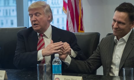 Donald Trump strokes Peter Thiel's hand during a meeting at Trump Tower in 2016