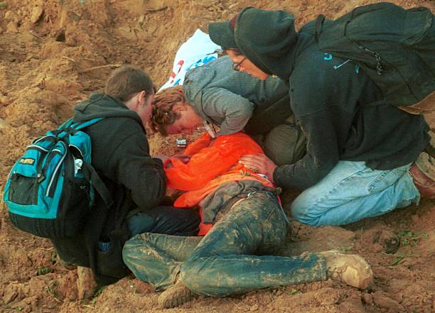 American peace activist Rachel Corrie lies bleeding while being helped by colleagues after she was run over by an Israeli bulldozer March 16, 2003 in....jpeg