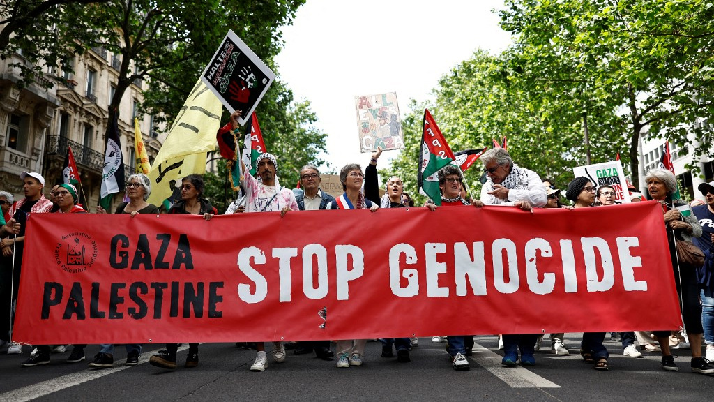 Protesters in Paris demand a Gaza ceasefire on 8 June 2024 (Sameer al-Doumy/AFP)