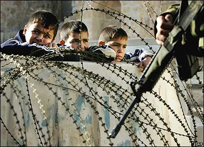 http://occupiedpalestine.files.wordpress.com/2010/10/kids-barbed-wire.jpg?w=588