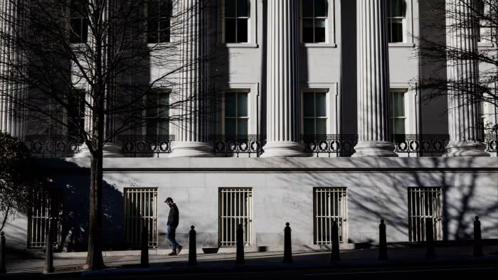 Shadows are cast over the front of the US Treasury building in Washington DC