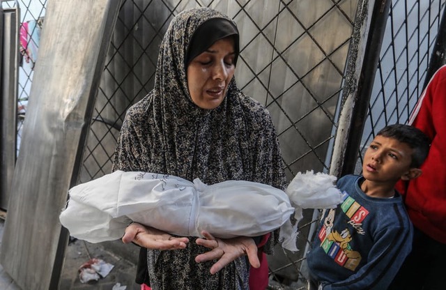 mother and massacred infant Rafah.jpeg