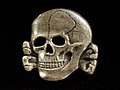 A skull with a black background

AI-generated content may be incorrect.