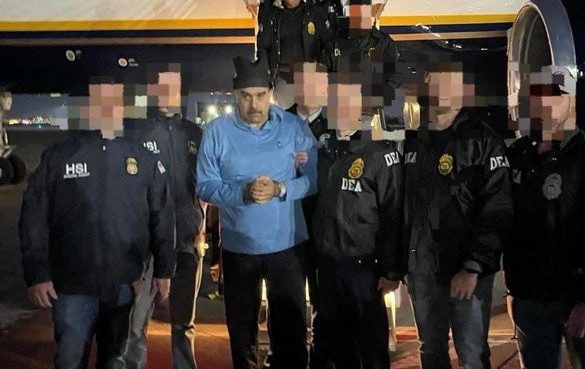 Nicolas Maduro is escorted by DEA agents after being captured in Caracas on Saturday morning