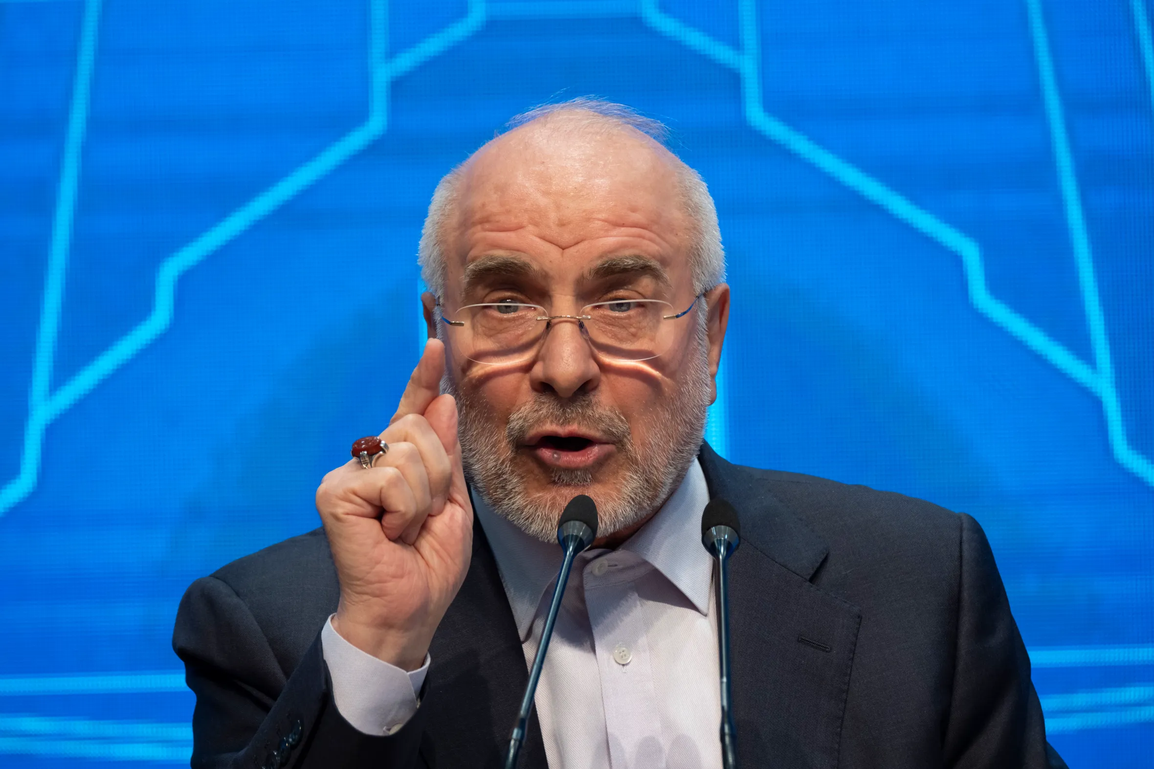 Iranian Parliament Speaker Mohammad Bagher Ghalibaf speaking at a media conference.