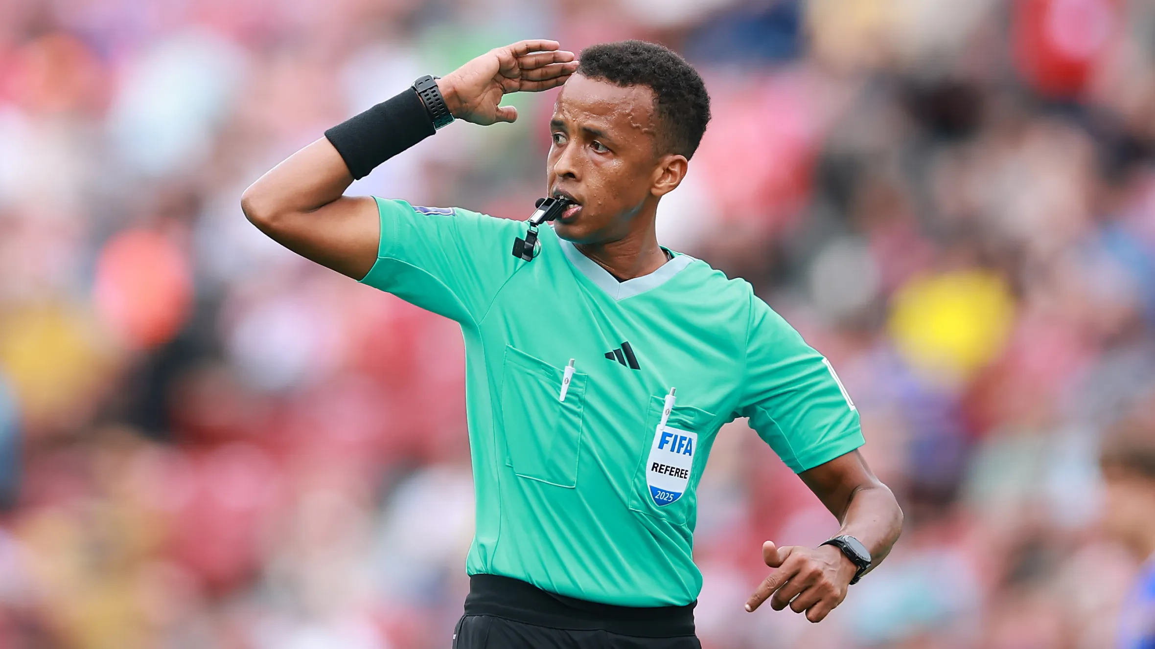 Referee Omar Artan gestures during a FIFA U-20 World Cup match.