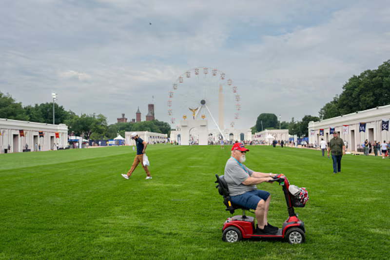 WASHINGTON, DC - JUNE 26: Visitors inspect the exhibitions at the Great American State Fair on June 26, 2026 in Washington, DC. The Freedom 250-backed Great American State Fair celebrating the 250th anniversary of the United States runs through July 10th. (Photo by Andrew Leyden/Getty Images)
