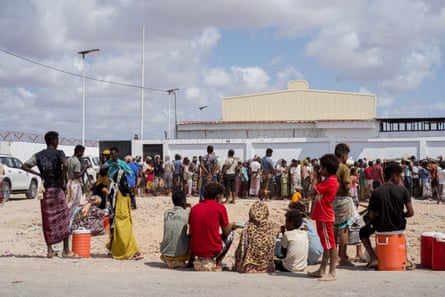 Yemeni refugees wait for aid distribution in Obock