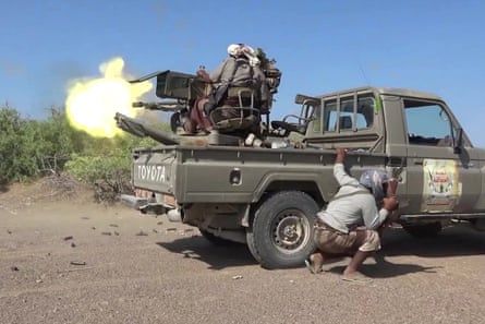 Pro Yemeni government forces firing on Huthis in Taiz province
