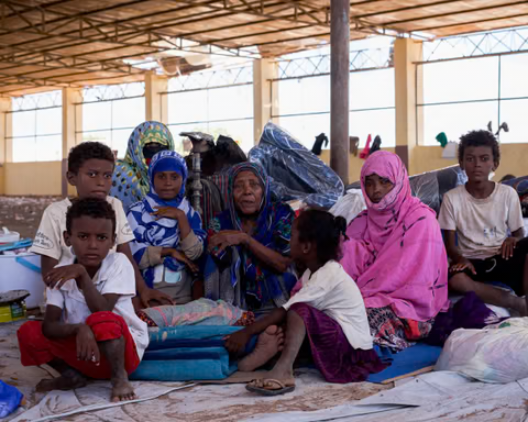 Yemeni refugee Madinah Abdullah (in pink) and her family members at the Markazi humanitarian site in Obock